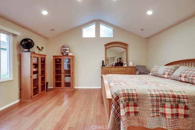 4002 Camerino St, Lakewood, CA 90712 - bedroom featuring light wood finished floors, multiple windows, lofted ceiling, baseboards, and recessed lighting