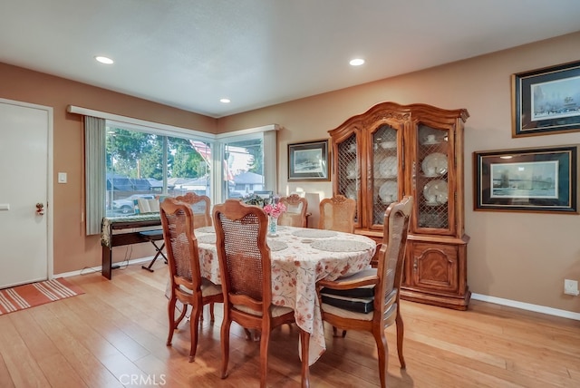 4002 Camerino St, Lakewood, CA 90712 - dining area with light wood-style floors, baseboards, and recessed lighting