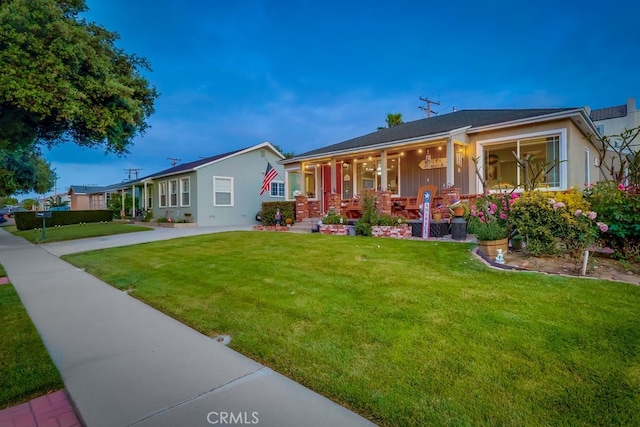 4002 Camerino St, Lakewood, CA 90712 - single story home featuring a porch and a front lawn