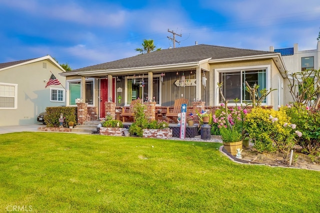 4002 Camerino St, Lakewood, CA 90712 - ranch-style home with a porch and a front yard