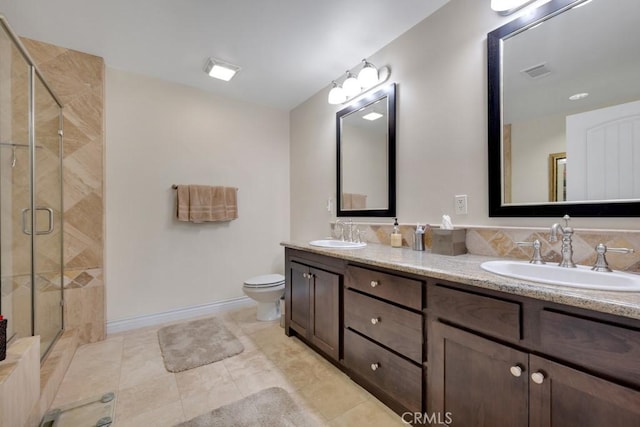 13200 Moorpark St Unit 201, Sherman Oaks, CA 91423 - full bath featuring double vanity, a stall shower, toilet, baseboards, and tile patterned flooring