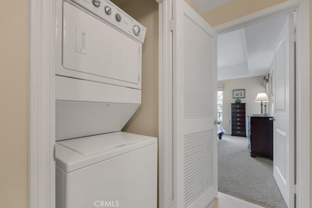 13200 Moorpark St Unit 201, Sherman Oaks, CA 91423 - laundry room with stacked washer / drying machine and carpet