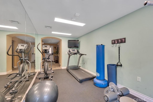 13200 Moorpark St Unit 201, Sherman Oaks, CA 91423 - exercise area featuring baseboards and arched walkways