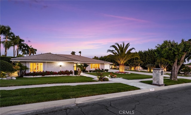 1738 N Ukiah Way, Upland, CA 91784 - ranch-style home featuring a garage, a lawn, driveway, and stucco siding