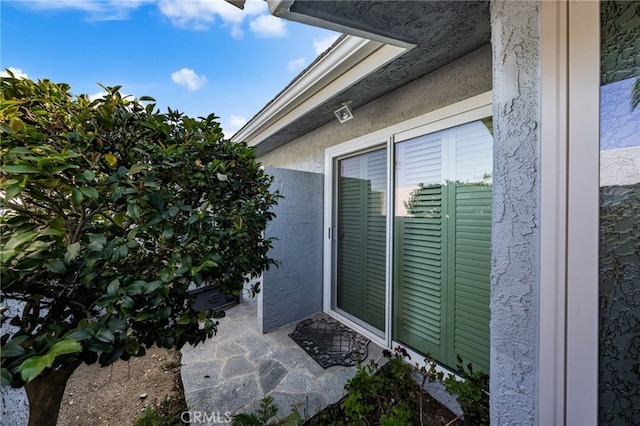 1738 N Ukiah Way, Upland, CA 91784 - doorway to property featuring stucco siding