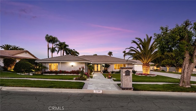 1738 N Ukiah Way, Upland, CA 91784 - ranch-style home with a lawn, driveway, stucco siding, and a tiled roof