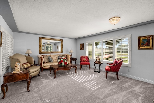 1738 N Ukiah Way, Upland, CA 91784 - living area featuring a textured ceiling, carpet, and baseboards