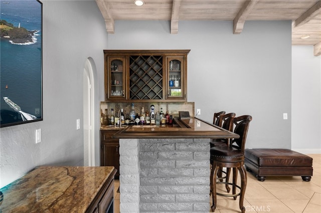 1738 N Ukiah Way, Upland, CA 91784 - indoor bar featuring light tile patterned floors, wood ceiling with exposed beams, tasteful backsplash, and arched walkways