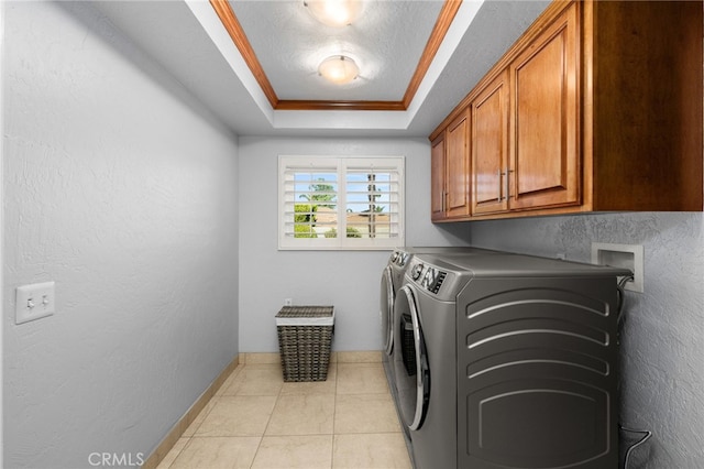 1738 N Ukiah Way, Upland, CA 91784 - laundry area with cabinet space, independent washer and dryer, baseboards, light tile patterned flooring, and a textured wall