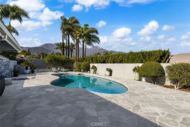 1738 N Ukiah Way, Upland, CA 91784 - view of pool with a mountain view, a patio area, and a fenced backyard