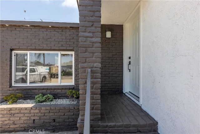 1342 W Magnolia St, Compton, CA 90220 - entrance to property featuring stucco siding and brick siding