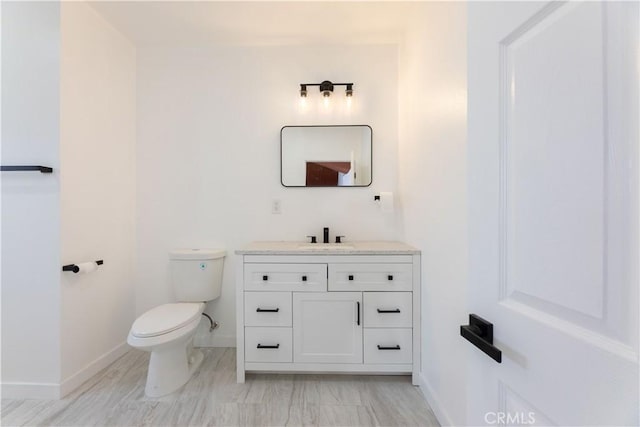 1342 W Magnolia St, Compton, CA 90220 - half bath with vanity, baseboards, and toilet