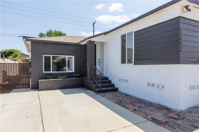 1342 W Magnolia St, Compton, CA 90220 - property entrance with crawl space and a patio