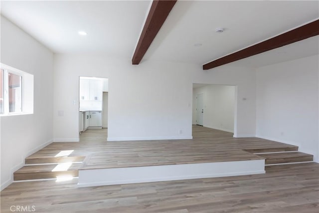 1342 W Magnolia St, Compton, CA 90220 - unfurnished room with beam ceiling, light wood finished floors, baseboards, recessed lighting, and a smoke detector