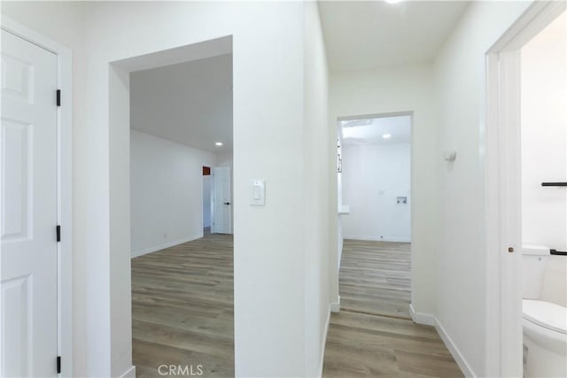 1342 W Magnolia St, Compton, CA 90220 - hallway with light wood-type flooring, baseboards, and recessed lighting