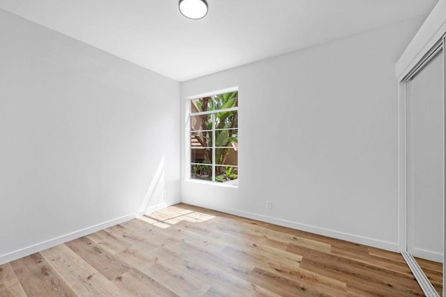 3581 Cameo Dr Unit 35, Oceanside, CA 92056 - spare room with light wood finished floors and baseboards