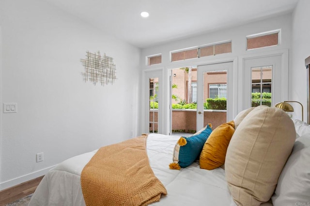 3581 Cameo Dr Unit 35, Oceanside, CA 92056 - bedroom with access to outside, wood finished floors, and recessed lighting