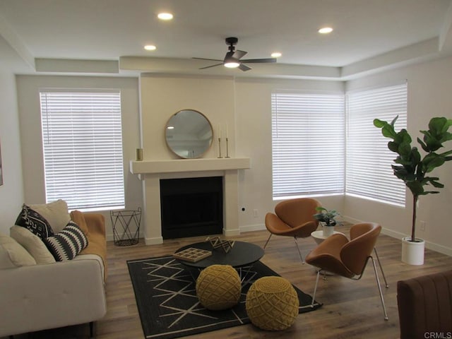 3581 Cameo Dr Unit 35, Oceanside, CA 92056 - living room featuring a large fireplace, recessed lighting, plenty of natural light, and wood finished floors