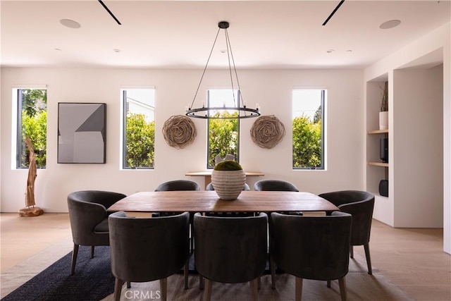 16828 Otsego St, Encino, CA 91436 - dining space featuring light wood-type flooring