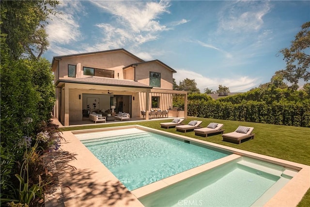 16828 Otsego St, Encino, CA 91436 - rear view of house with an outdoor living space, a yard, stucco siding, a pool with connected hot tub, and a patio
