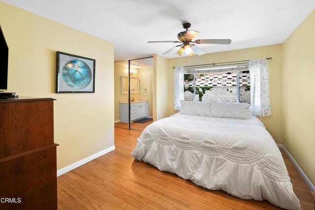 27585 Pamplico Dr, Valencia, CA 91354 - bedroom featuring light wood-style flooring, baseboards, a ceiling fan, and connected bathroom