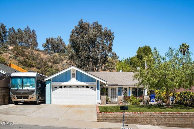 27585 Pamplico Dr, Valencia, CA 91354 - ranch-style house with an attached garage, concrete driveway, and board and batten siding
