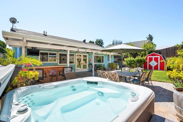 27585 Pamplico Dr, Valencia, CA 91354 - view of patio with french doors and a hot tub