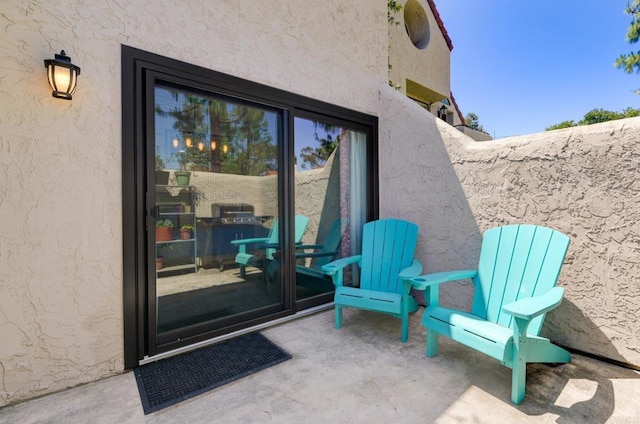 11855 Caminito Ronaldo Unit 108, San Diego, CA 92128 - view of exterior entry featuring stucco siding