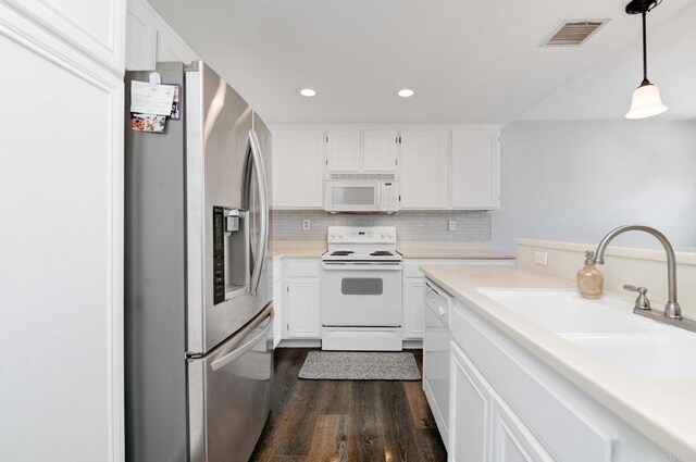 11855 Caminito Ronaldo Unit 108, San Diego, CA 92128 - kitchen featuring white appliances, recessed lighting, dark wood-style flooring, light countertops, and white cabinetry