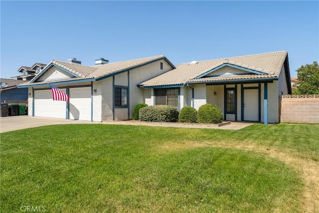 42330 61st St W, Lancaster, CA 93536 - view of front facade featuring an attached garage, stucco siding, a chimney, and driveway