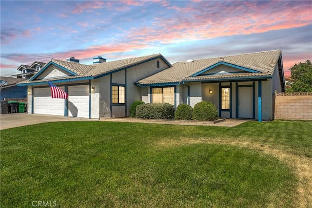 42330 61st St W, Lancaster, CA 93536 - view of front of home with stucco siding, a tile roof, a garage, a chimney, and driveway