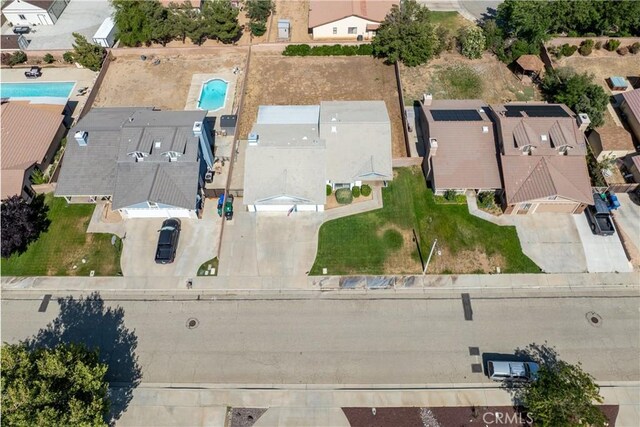 42330 61st St W, Lancaster, CA 93536 - aerial view of property's location with a pool area and nearby suburban area