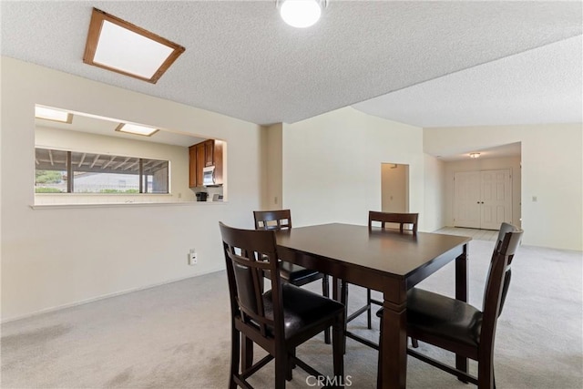 42330 61st St W, Lancaster, CA 93536 - dining room featuring light colored carpet and a textured ceiling
