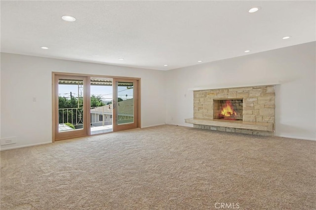 4612 W 132nd St, Hawthorne, CA 90250 - unfurnished living room with recessed lighting, carpet flooring, a stone fireplace, and baseboards