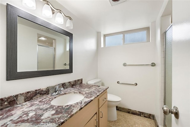 4612 W 132nd St, Hawthorne, CA 90250 - bathroom with toilet, baseboards, vanity, and an enclosed shower