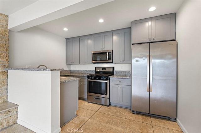 4612 W 132nd St, Hawthorne, CA 90250 - kitchen featuring appliances with stainless steel finishes, gray cabinets, dark speckled floor, and recessed lighting