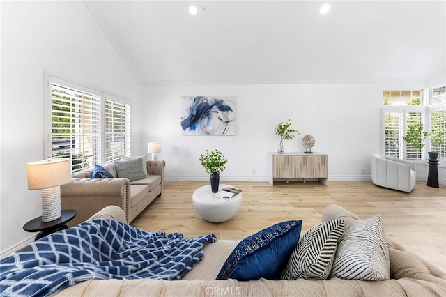 14121 Exeter Ct, Fontana, CA 92336 - living room with baseboards, wood finished floors, recessed lighting, and high vaulted ceiling