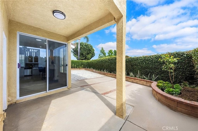 14121 Exeter Ct, Fontana, CA 92336 - fenced backyard featuring a patio area