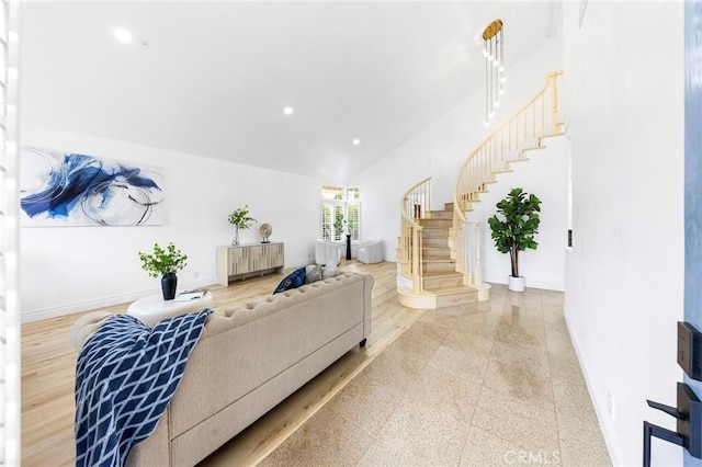 14121 Exeter Ct, Fontana, CA 92336 - living room featuring baseboards, stairs, recessed lighting, granite tiled floors, and vaulted ceiling