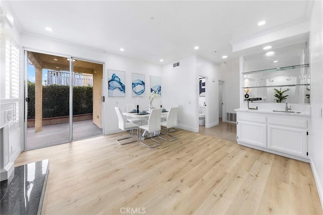14121 Exeter Ct, Fontana, CA 92336 - dining room featuring light wood-type flooring, recessed lighting, and baseboards