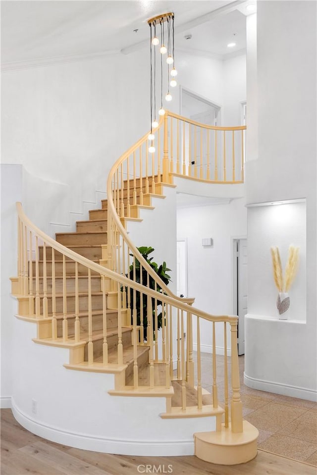 14121 Exeter Ct, Fontana, CA 92336 - stairs with a towering ceiling and baseboards