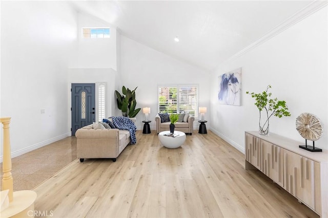 14121 Exeter Ct, Fontana, CA 92336 - living room with high vaulted ceiling, light wood-style floors, and baseboards