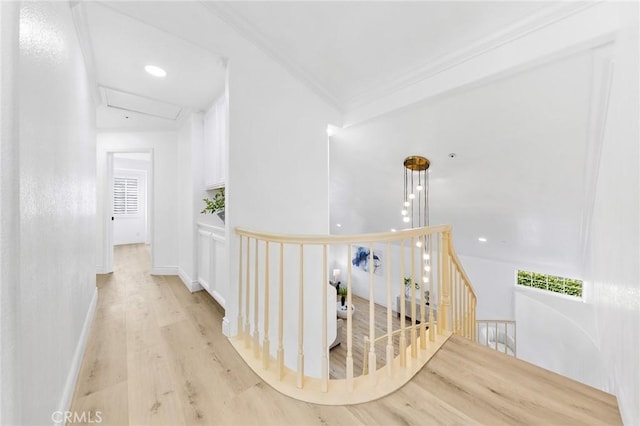 14121 Exeter Ct, Fontana, CA 92336 - hall with an upstairs landing, light wood-style flooring, ornamental molding, and recessed lighting