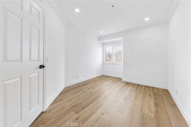 14121 Exeter Ct, Fontana, CA 92336 - unfurnished room featuring ornamental molding, baseboards, light wood-type flooring, and recessed lighting