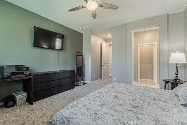 29042 Botanical Cir, Menifee, CA 92584 - bedroom with carpet, baseboards, and a ceiling fan