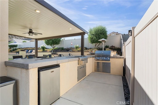 29042 Botanical Cir, Menifee, CA 92584 - fenced backyard featuring ceiling fan and a patio area