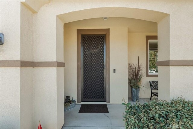 29042 Botanical Cir, Menifee, CA 92584 - view of exterior entry featuring stucco siding