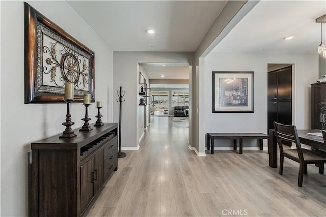 29042 Botanical Cir, Menifee, CA 92584 - hall with light wood finished floors, baseboards, and recessed lighting