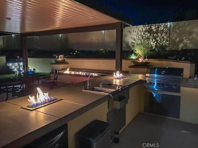 29042 Botanical Cir, Menifee, CA 92584 - view of patio with an outdoor fire pit