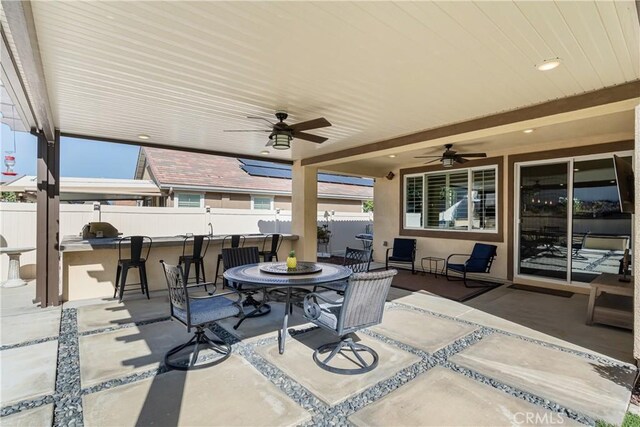 29042 Botanical Cir, Menifee, CA 92584 - view of patio with a bar and ceiling fan